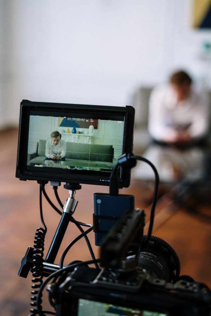 Mastering the First Impression: Your intriguing post title goes here Camera focusing on a counseling session in an office setting, capturing a seated individual.